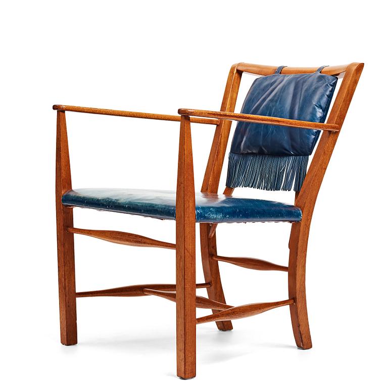 Josef Frank, a mahogany and blue leather chair for Firma Svenskt Tenn, Sweden probably 1950-60's.