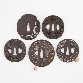 Five iron tsubas, China and Japan, probably 19th Century. Two with tags marked 'Oldman'.