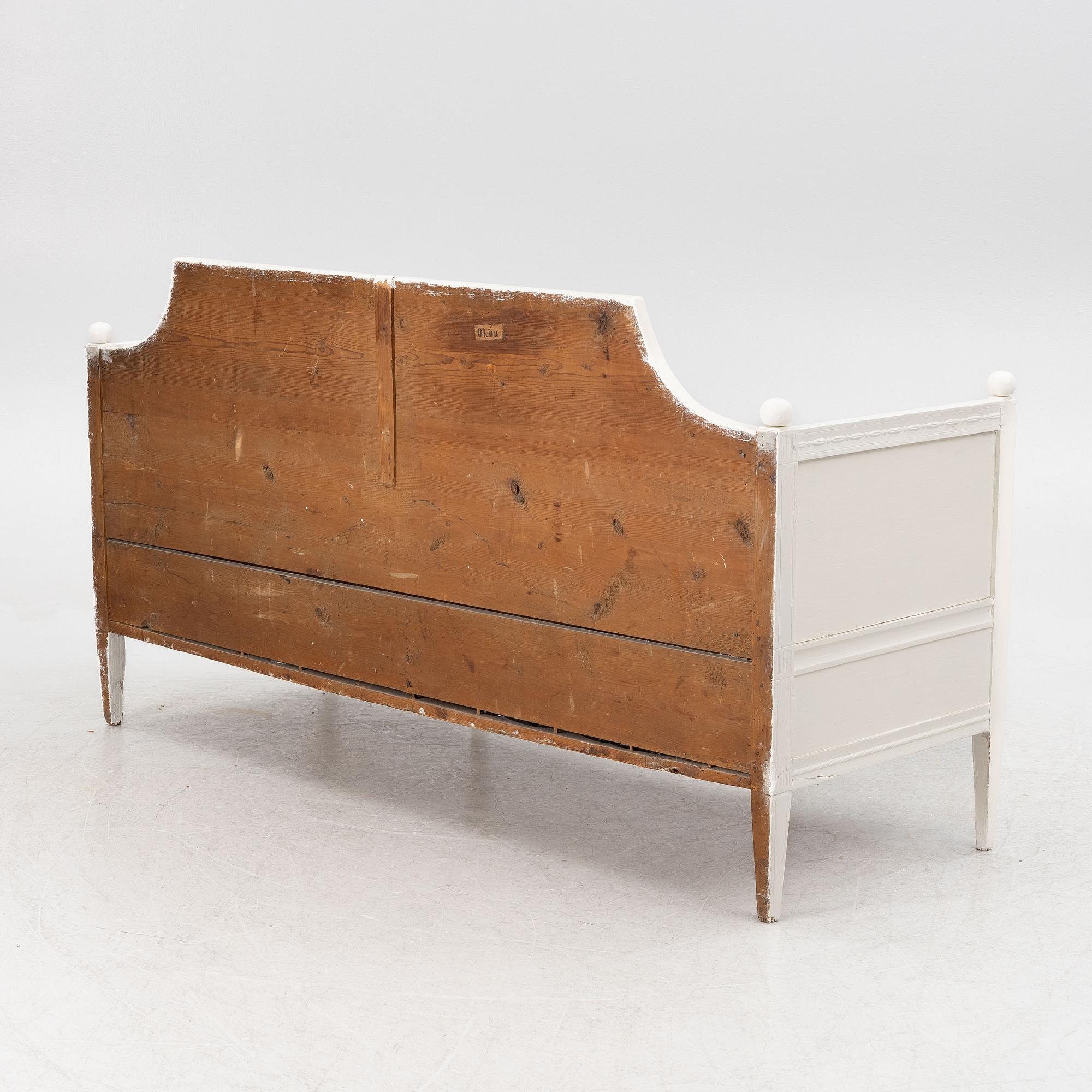 A late Gustavian sofa, early 19th century.