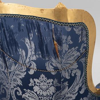 A pair of Louis XVI style armchairs, late 20th Century.