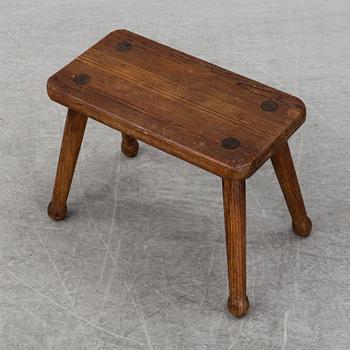 A late 20th Century stool.