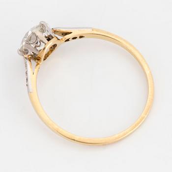 RING, 18K gold and platinum with an old cut diamond approx. 0.60 cts, and 6 small rose cut diamonds.