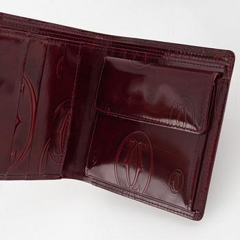 Cartier, plånböcker 3 st samt nyckelring.