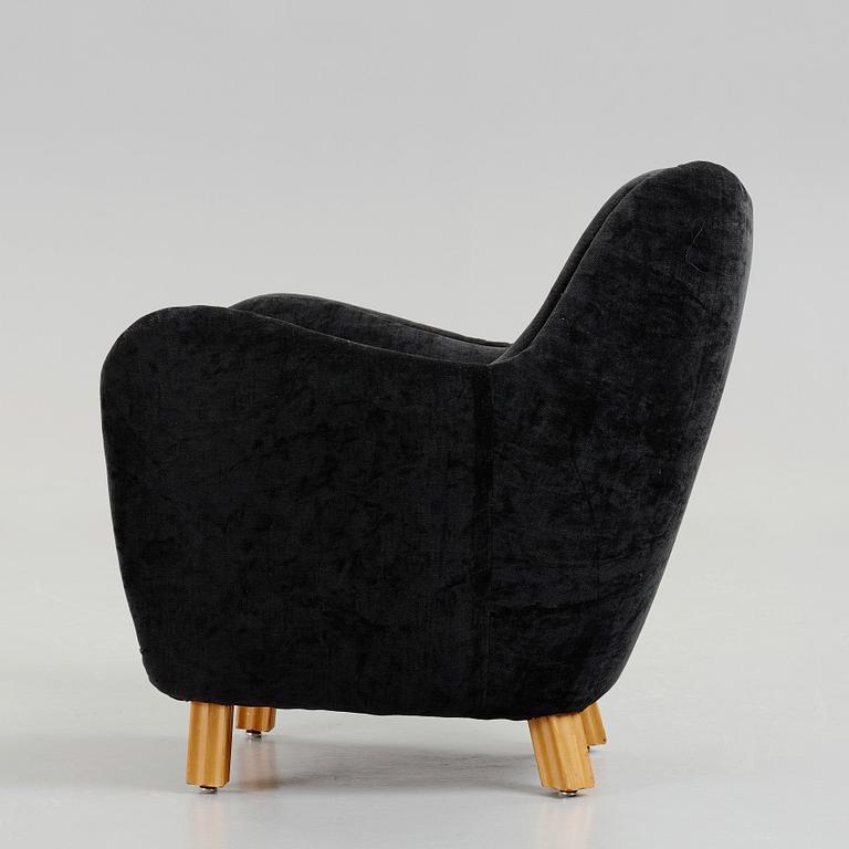 Swedish designer, an upholstered easy chair, 1950's.