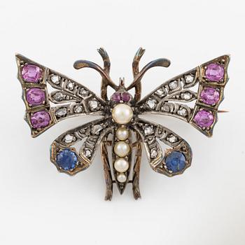 Brooch in the form of a butterfly, 14K gold and silver set with rose-cut diamonds, rubies, sapphires, and pearls.