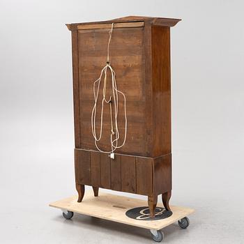 A mahogany veneered book cabinet. 19th Century.