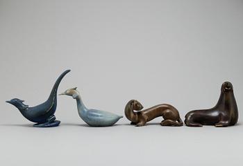 GUNNAR NYLUND, four stoneware figurines, from Rörstrand.