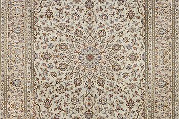 A Kashan carpet, c. 359 x 250 cm.