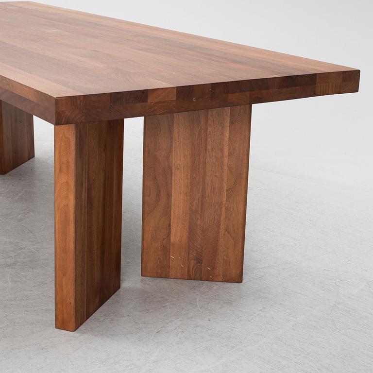 Dusty Deco, a contemporary walnut dining table.