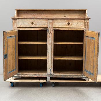 A provincial Gustavian painted pine sideboard, early 19th Century.