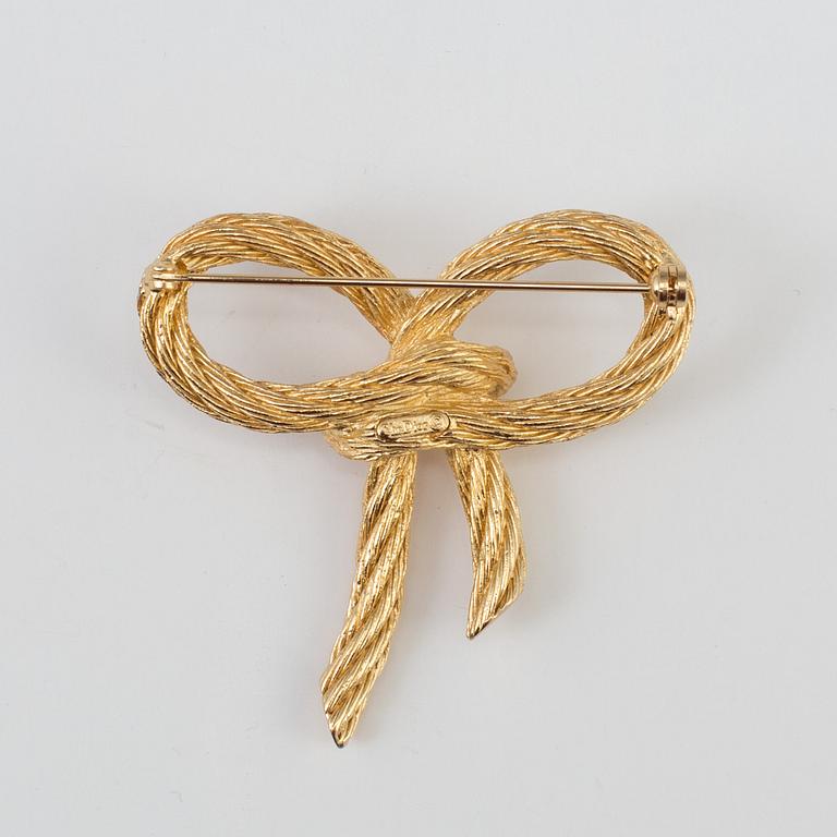 A BROSCH by Christian Dior.