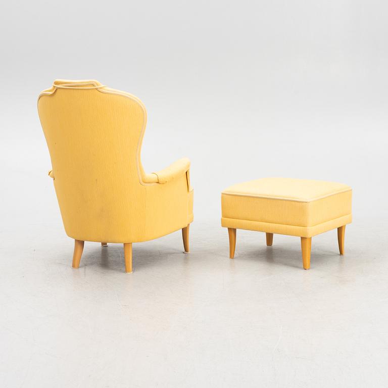 Carl Malmsten, a "Farmor" armchair with ottoman, O.H. Sjögren, Sweden.