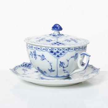 Royal Copenhagen, twelve consommé cups with saucers, 'Blue Fluted Half Lace', Denmark.