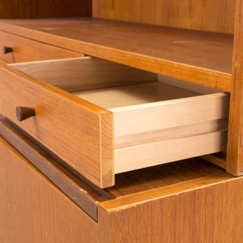 A teak vaneered book case, 1950's/60's.