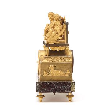 A French Empire early 19th century mantel clock.