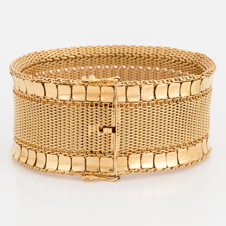 ARMBAND, 18K guld, vävt mönster med rektangulära guldplattor på kanterna.