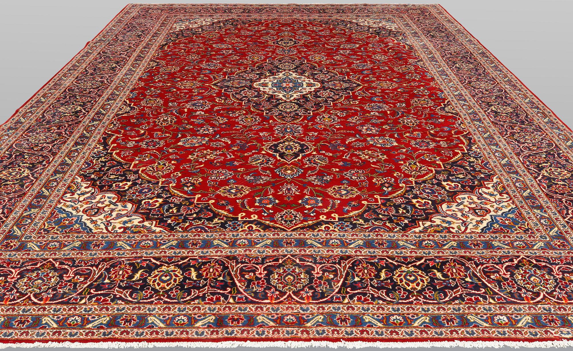A Keshan carpet, 398 x 298 cm.