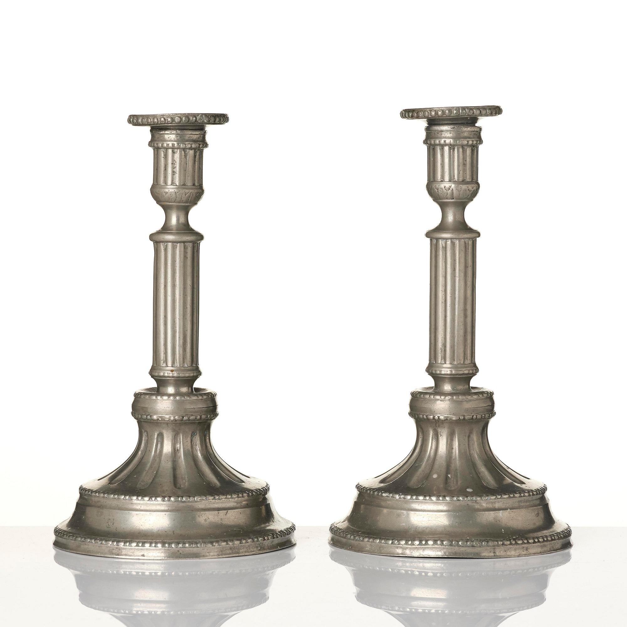 A pair of Gustavian pewter candlesticks by P. Gillman, Stockholm 1786.