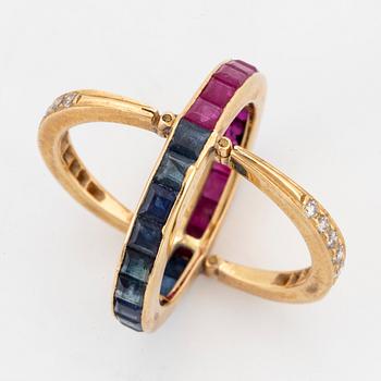 Calibre-cut ruby and sapphire and brillint-cut diamond ring.