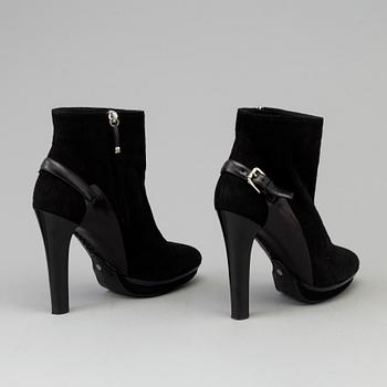 Black suede bootie by Ralph Lauren.