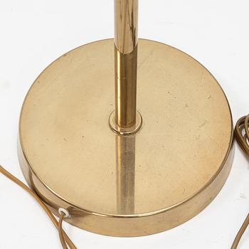 A pair of model 'G-18' brass floor lights, Bergboms, second half of the 20th Century.