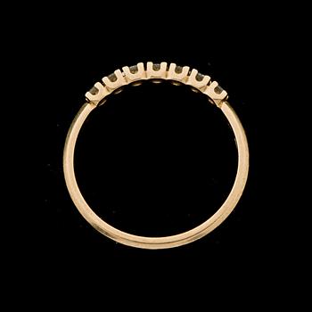 RING, 18 k guld med briljantslipade diamanter ca 0,21 ct, Hans Strömdahl, Stockholm, 1988. Vikt ca 2 g.