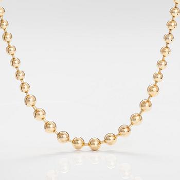 DIOR. A necklace and a pair of earrings in gold coloured metal. Marked Chr. Dior, Germany.