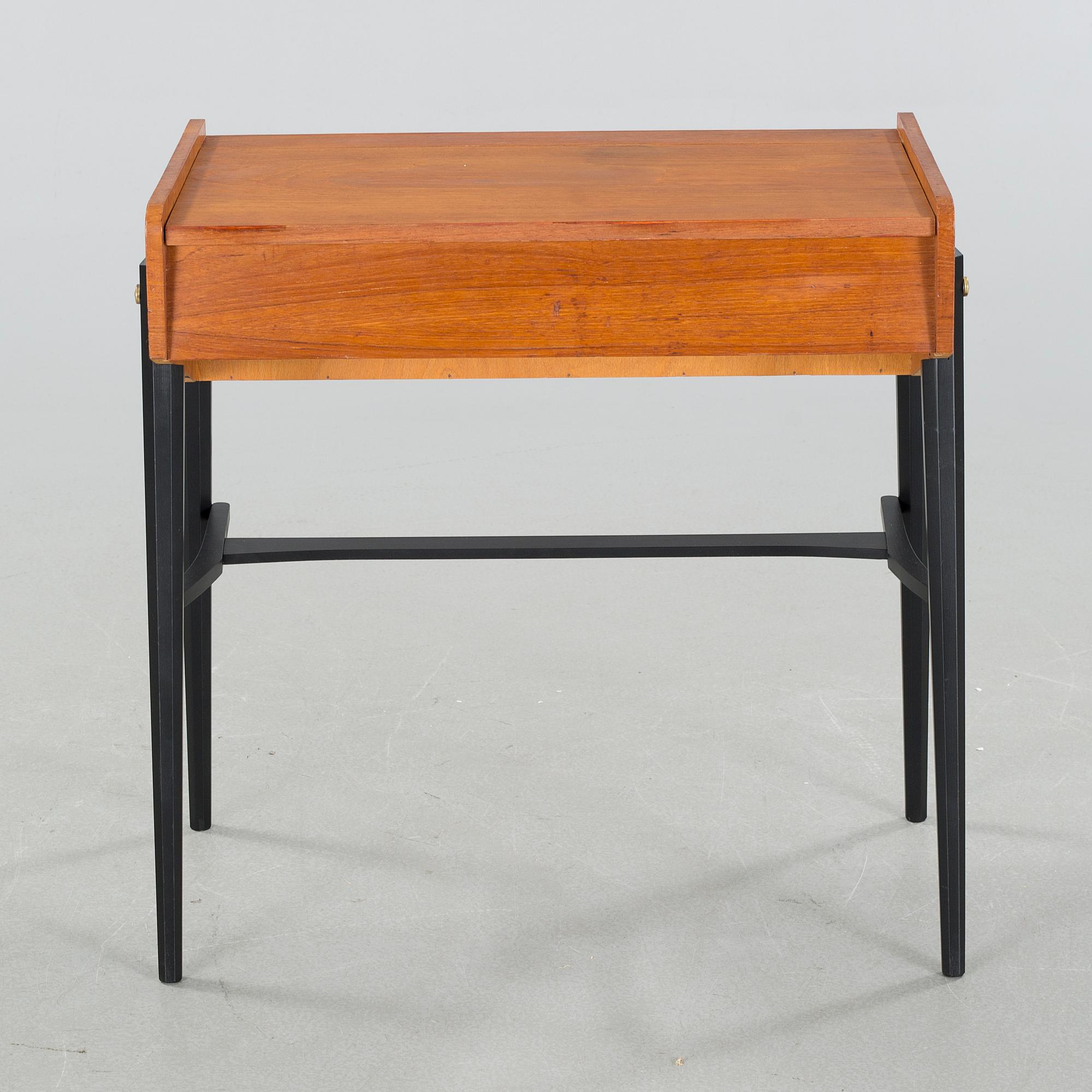 A mid 20th century dressing table and stool.