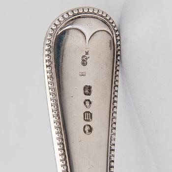 A soup ladle in sterling silver, mark of George William Adams, London 1867.