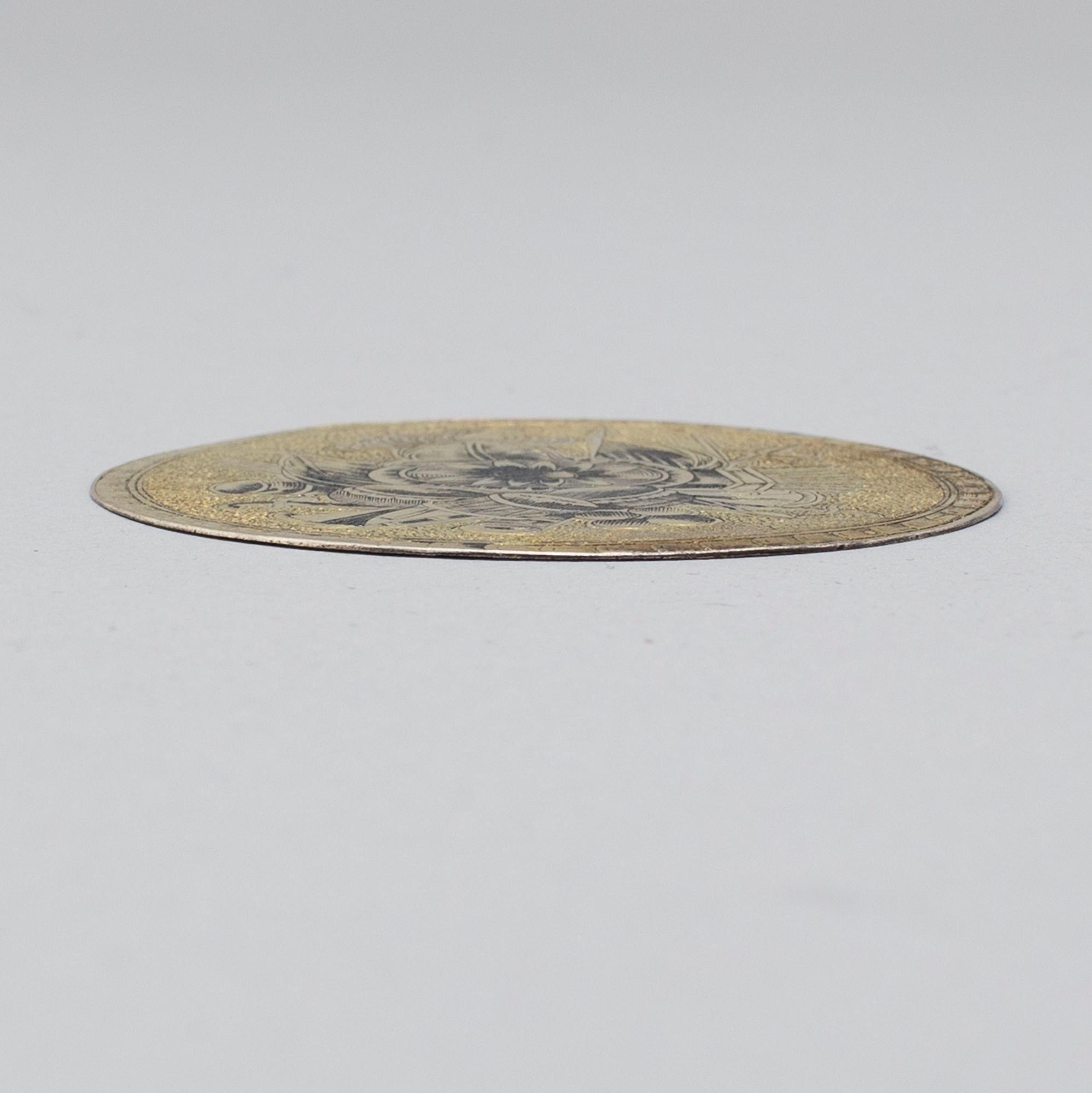 A Russian early 19th century silver-gilt and niello plaque, possibly Moscow.