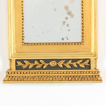 A first half of the 19th century Empire mirror.