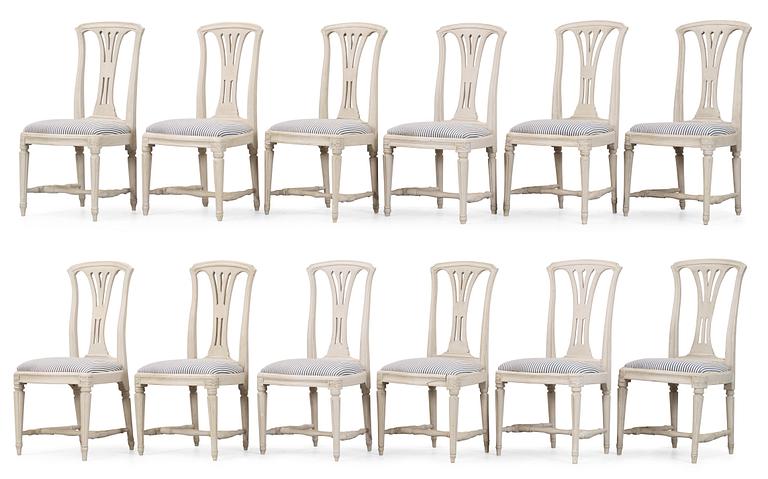 Twelve matched Gustavian chairs.