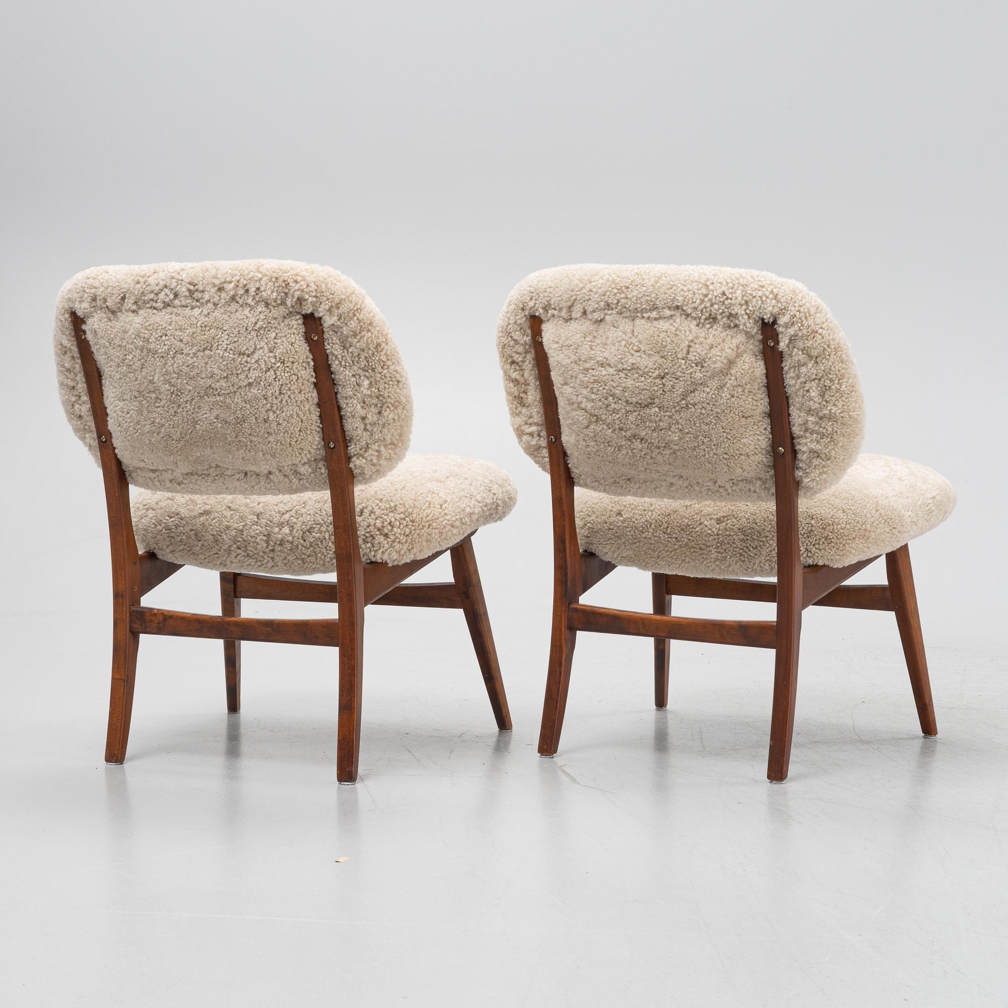 A pair of mid 20th century lounge chairs.