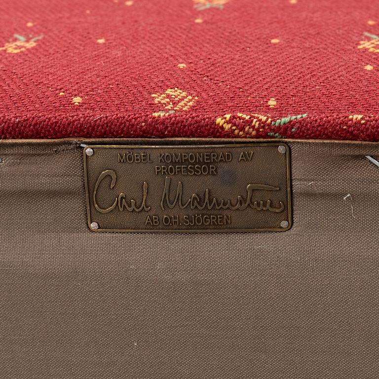 Carl Malmsten, a 'Häggbom' armchair with a 'Jättepaddan' ottoman, AB OH Sjögren, Tranås.