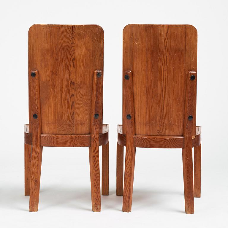 Axel Einar Hjorth, a pair of stained pine 'Lovö' chairs, Nordiska Kompaniet, Sweden 1930s.