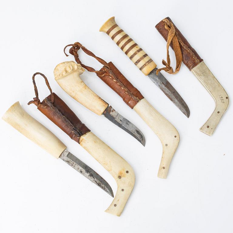 Nine half-horn knives, unidentified craftsman.