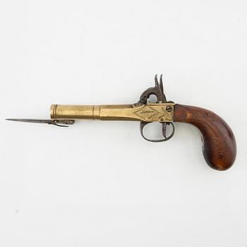 Double-barrel percussion pistol with bayonet, 19th century.