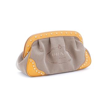 PRADA, a beige canvas clutch bag.
