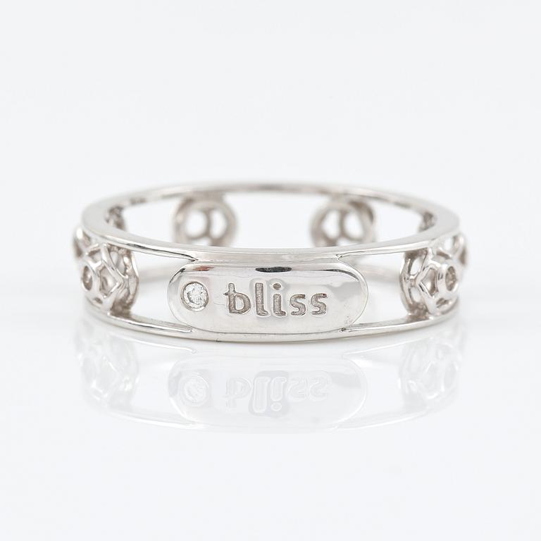 RING, Bliss, Italien. genombruten 18K vitguld med diamant på logoplatta 0.007ct.