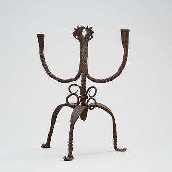 A Swedish 18th century wrought-iron two-light candlestick.