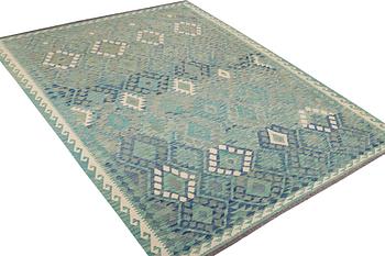 An Afghan kilim carpet, c. 299 x 213 cm.
