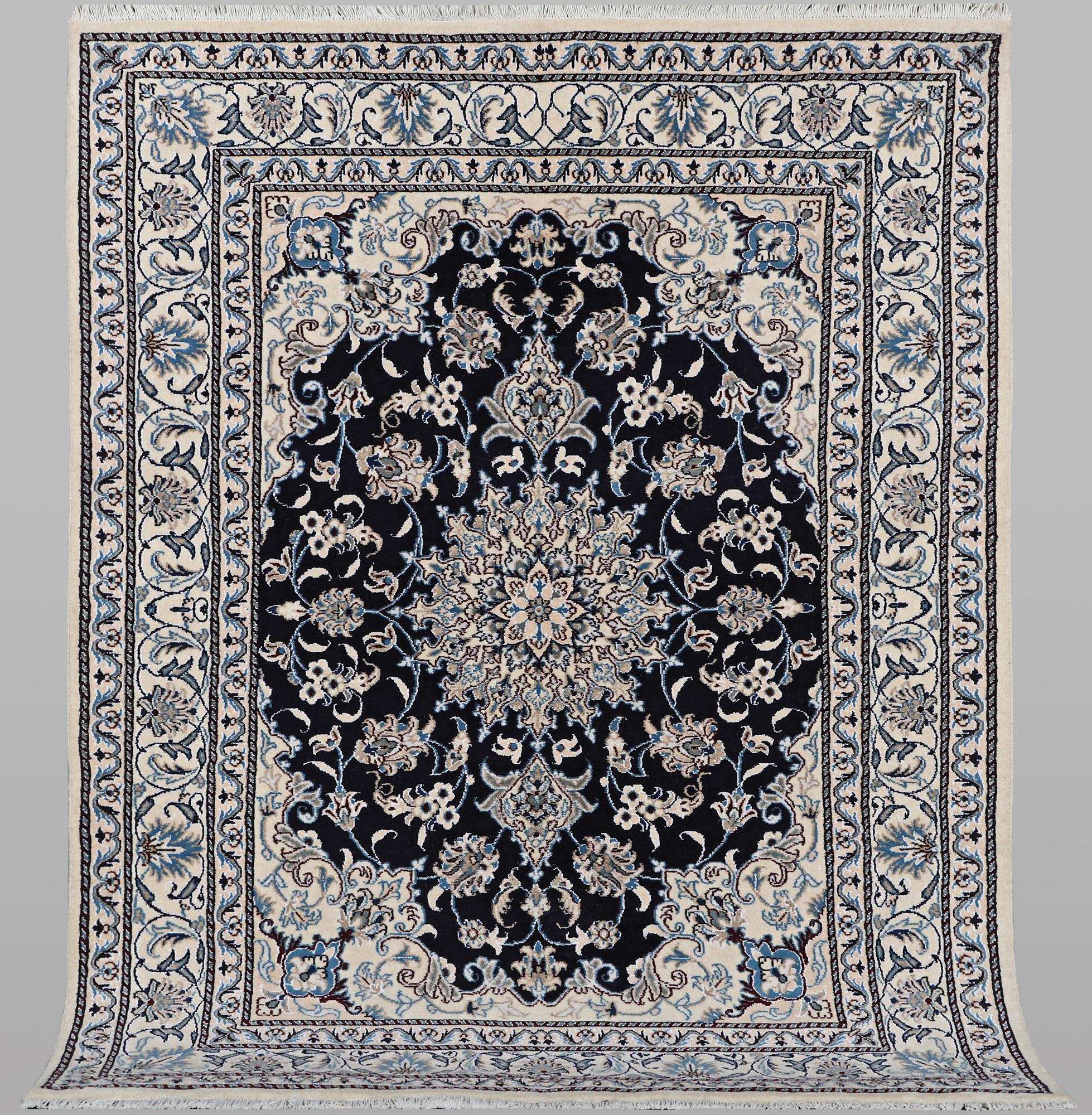 A rug, Nain, part silk, ca 198 x 144 cm.