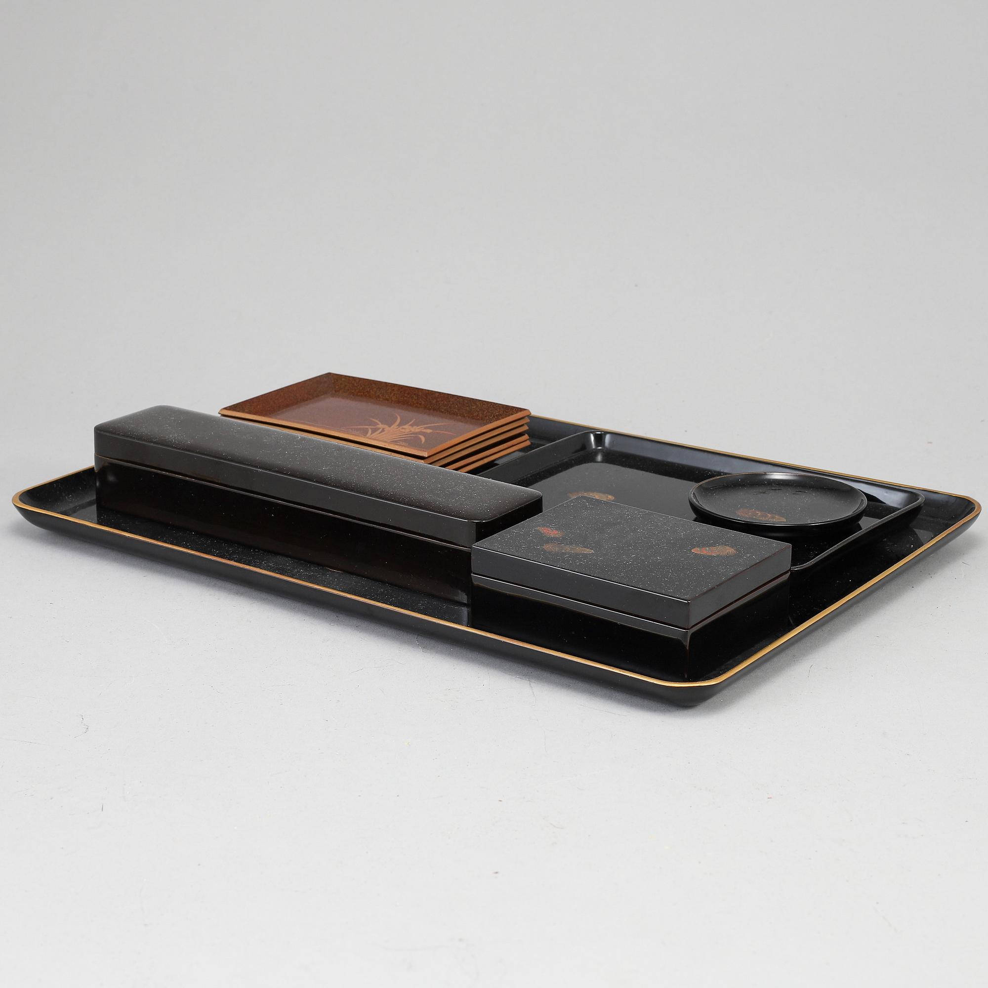 A group of Japanese lacquer trays and boxes, early 20th Century. (10 pieces).