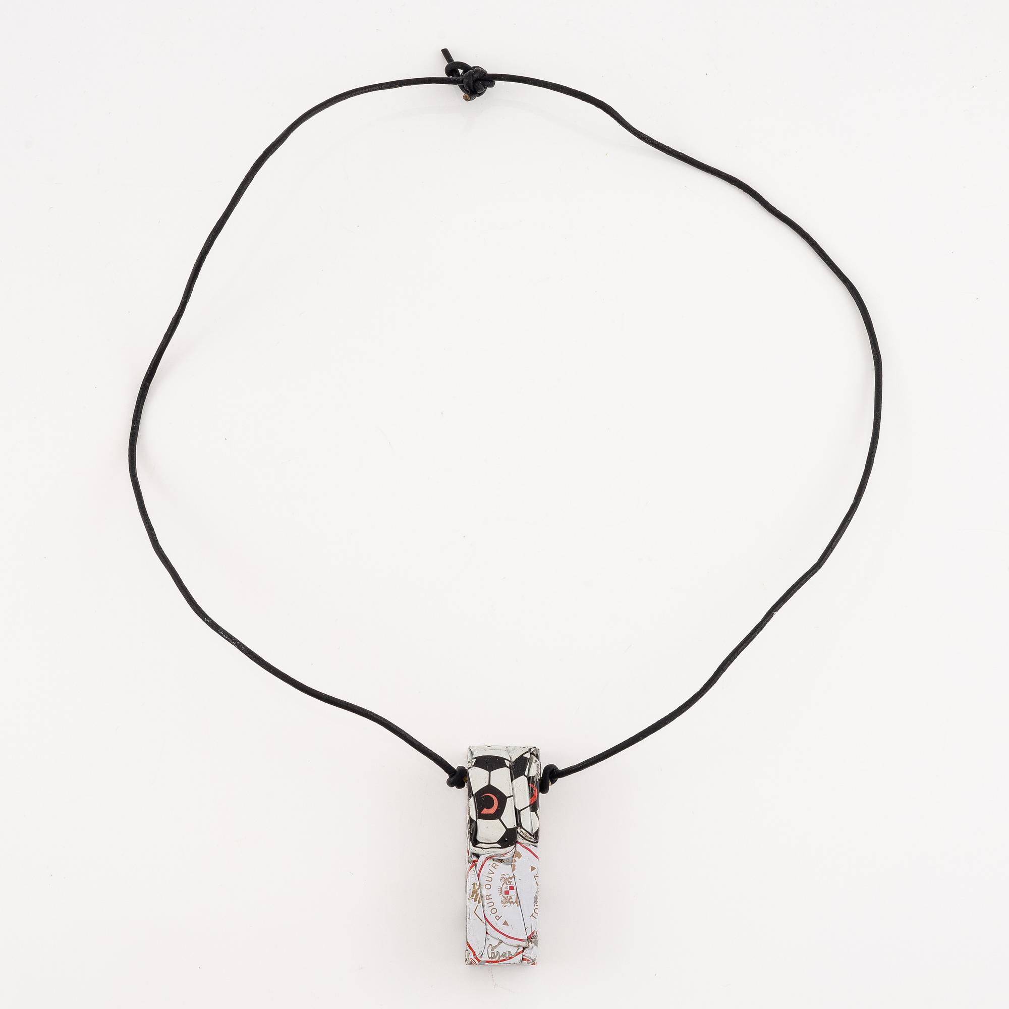 César Baldaccini, compression, pendant made of compressed beer bottle caps.