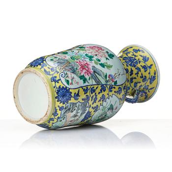 A famille rose yellow ground vase, late Qing dynasty.