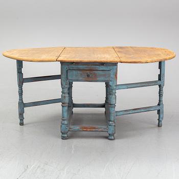 An 18th century baroque gate leg table.