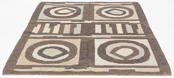 a carpet, flat weave, ca 242,5 x 170,5 cm, signed GBJ as well as a weavers signature in the form of a light blue square.