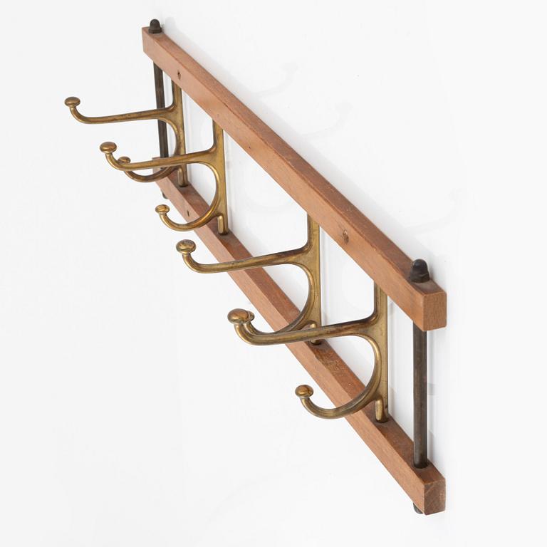 A 'Dekorativ' clothes hanger, Skogslunds Metallgjuteri, Anderstorp, 1950's/60's.