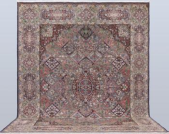 A Kirman lavash milifleur carpet, 400 x 310 cm.
