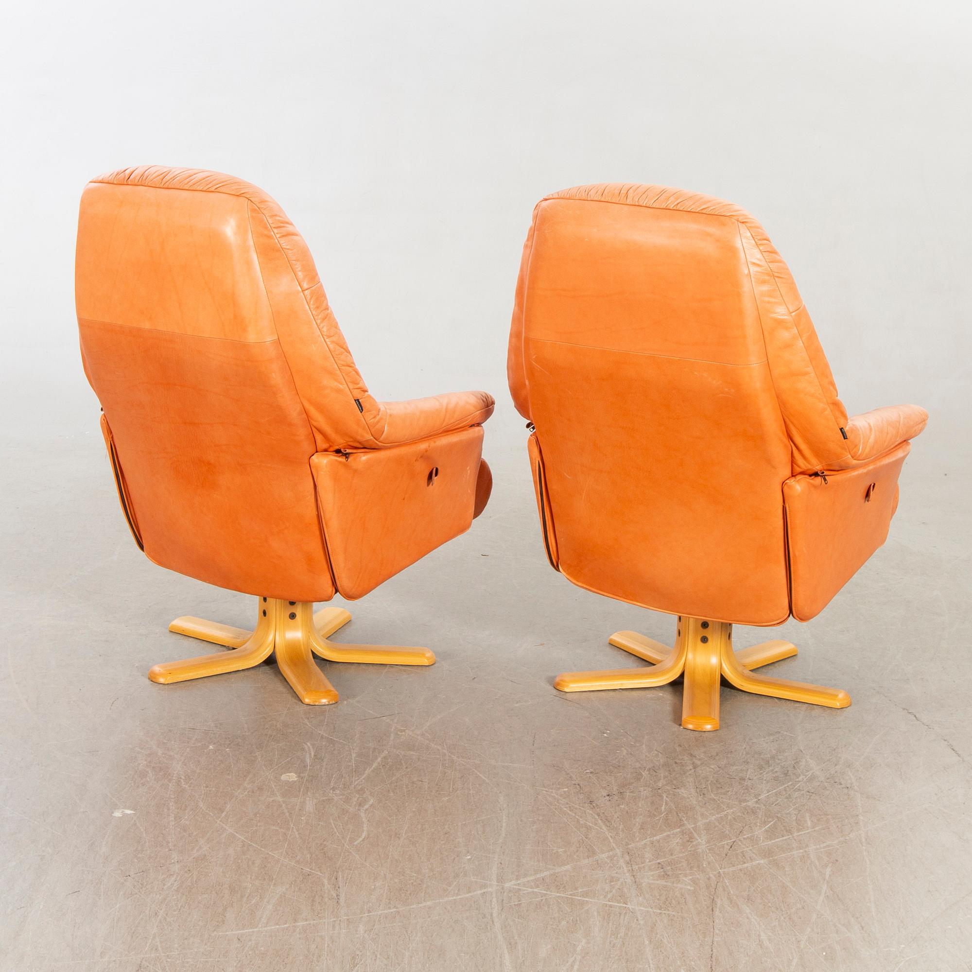 Skalma Denmark, two armchairs with footstool, leather, 20th century later part.
